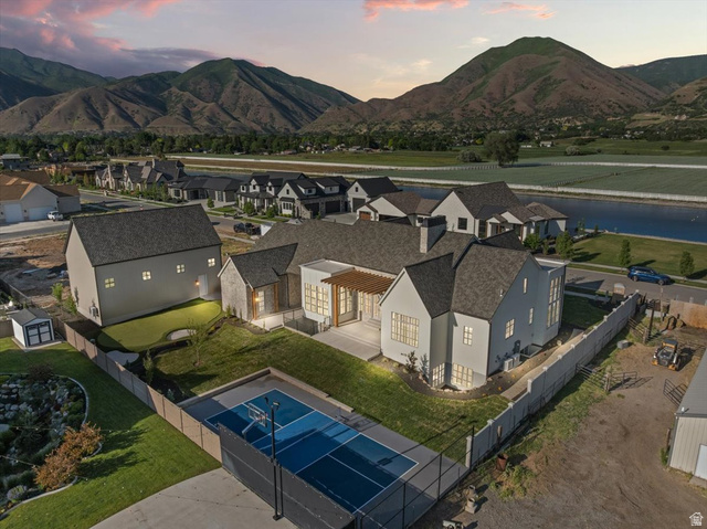 478 South Maple Lakes Drive Mapleton, UT 84664 - Photo 2 of 51 Contemporary residence featuring a light-colored exterior and dark-shingle roofing