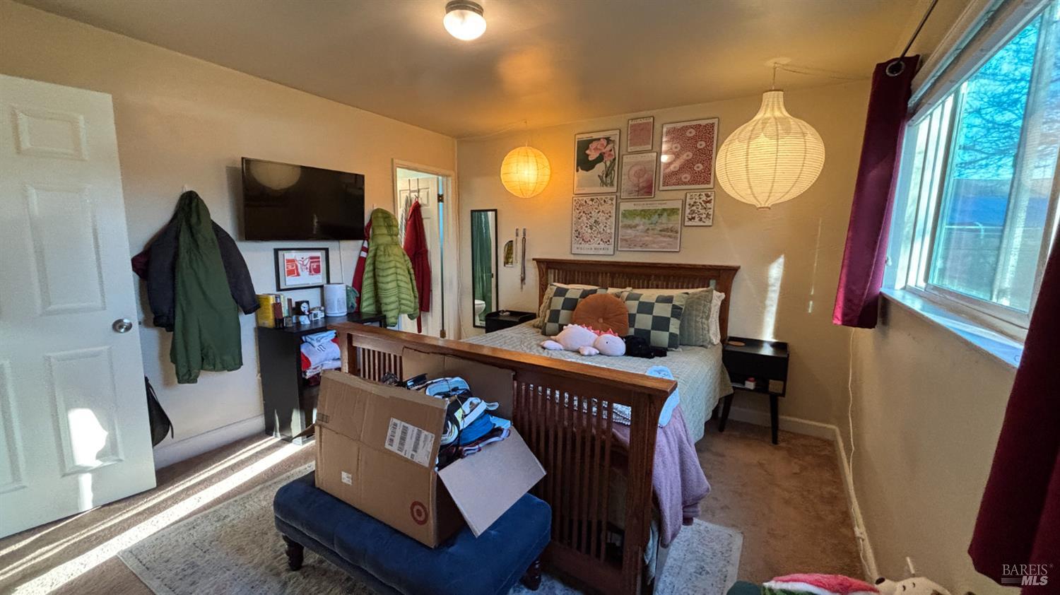 6120 Montecito Boulevard Santa Rosa, CA 95409 - Photo 8 of 17 a living room with furniture a flat screen tv and a fireplace