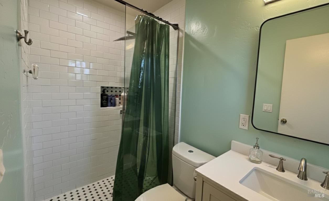6120 Montecito Boulevard Santa Rosa, CA 95409 - Photo 9 of 17 a bathroom with a sink toilet and shower