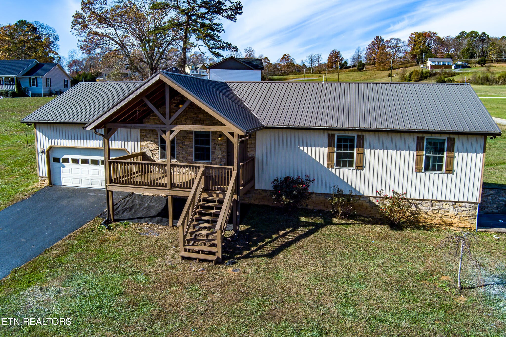 140 Washita Rutledge, TN 37861 - Photo 1 of 38 a view of a house with wooden deck and furniture