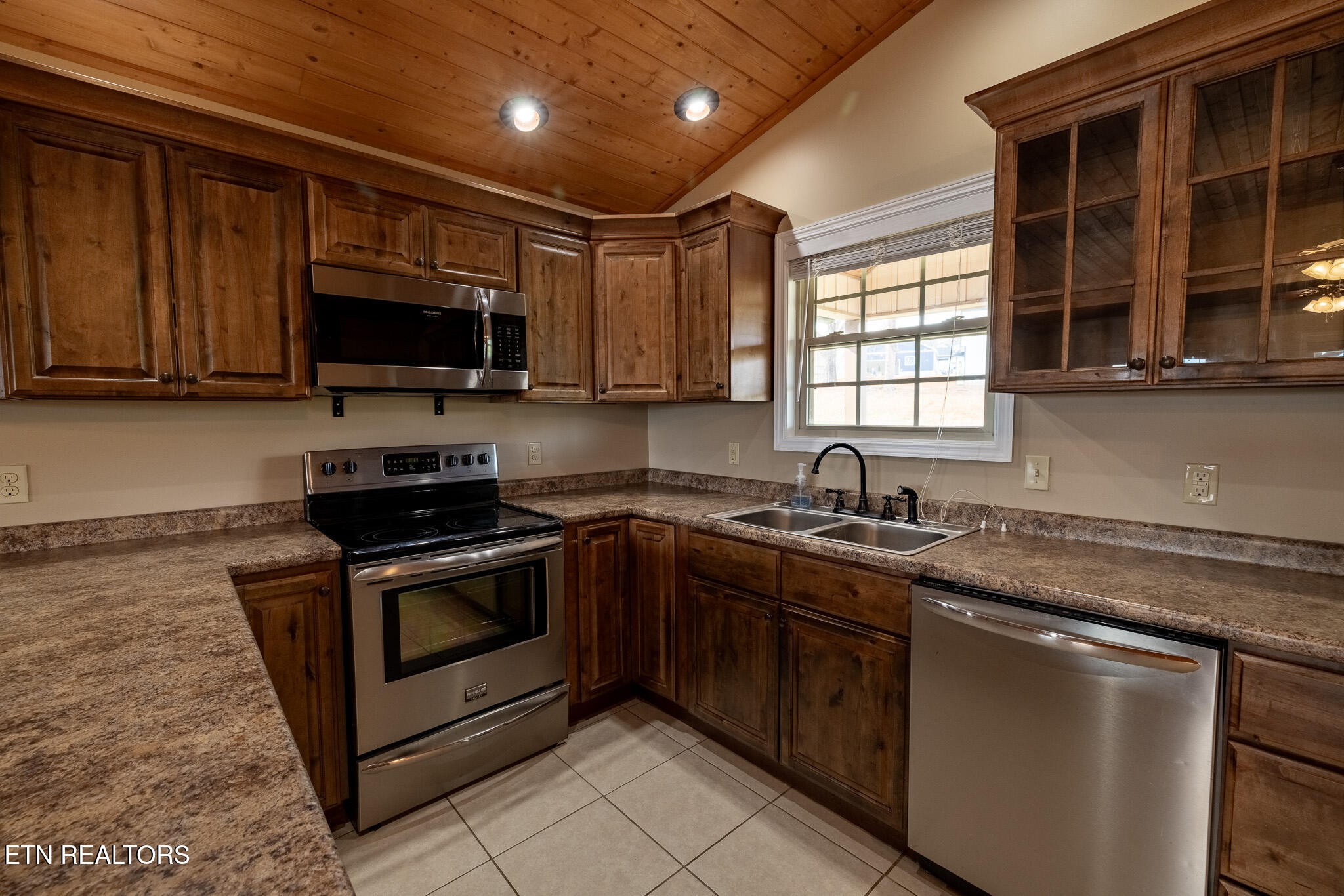 140 Washita Rutledge, TN 37861 - Photo 12 of 38 a kitchen with stainless steel appliances granite countertop a sink and a stove