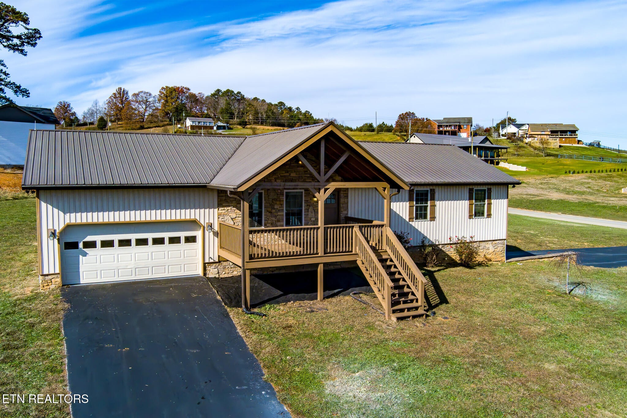 140 Washita Rutledge, TN 37861 - Photo 2 of 38 a front view of a house with a yard