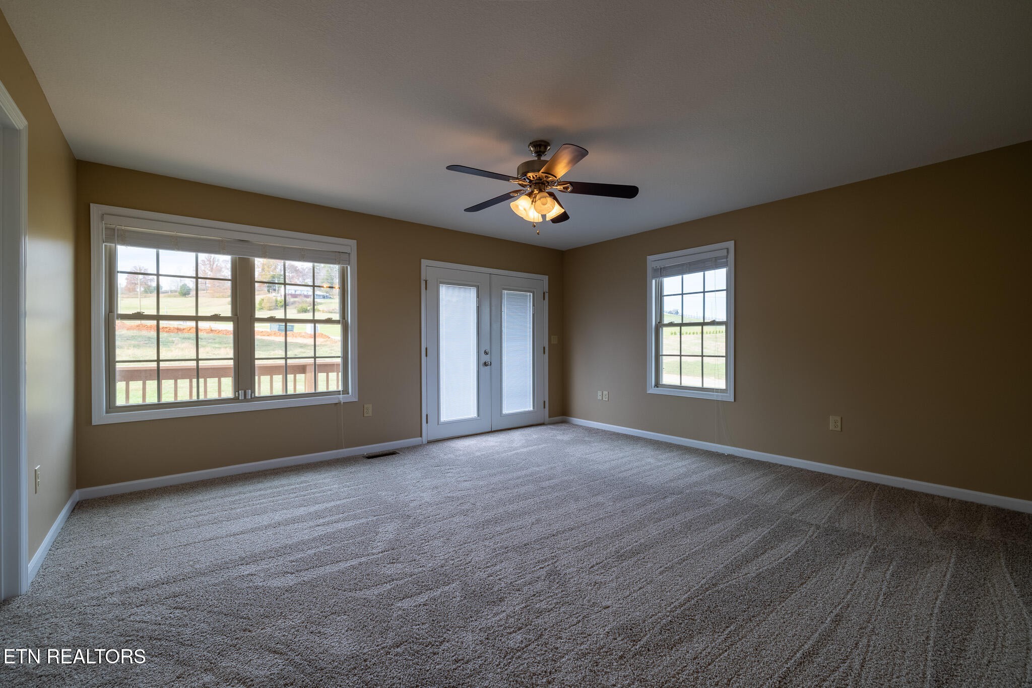 140 Washita Rutledge, TN 37861 - Photo 21 of 38 a view of n empty room with window and a kitchen
