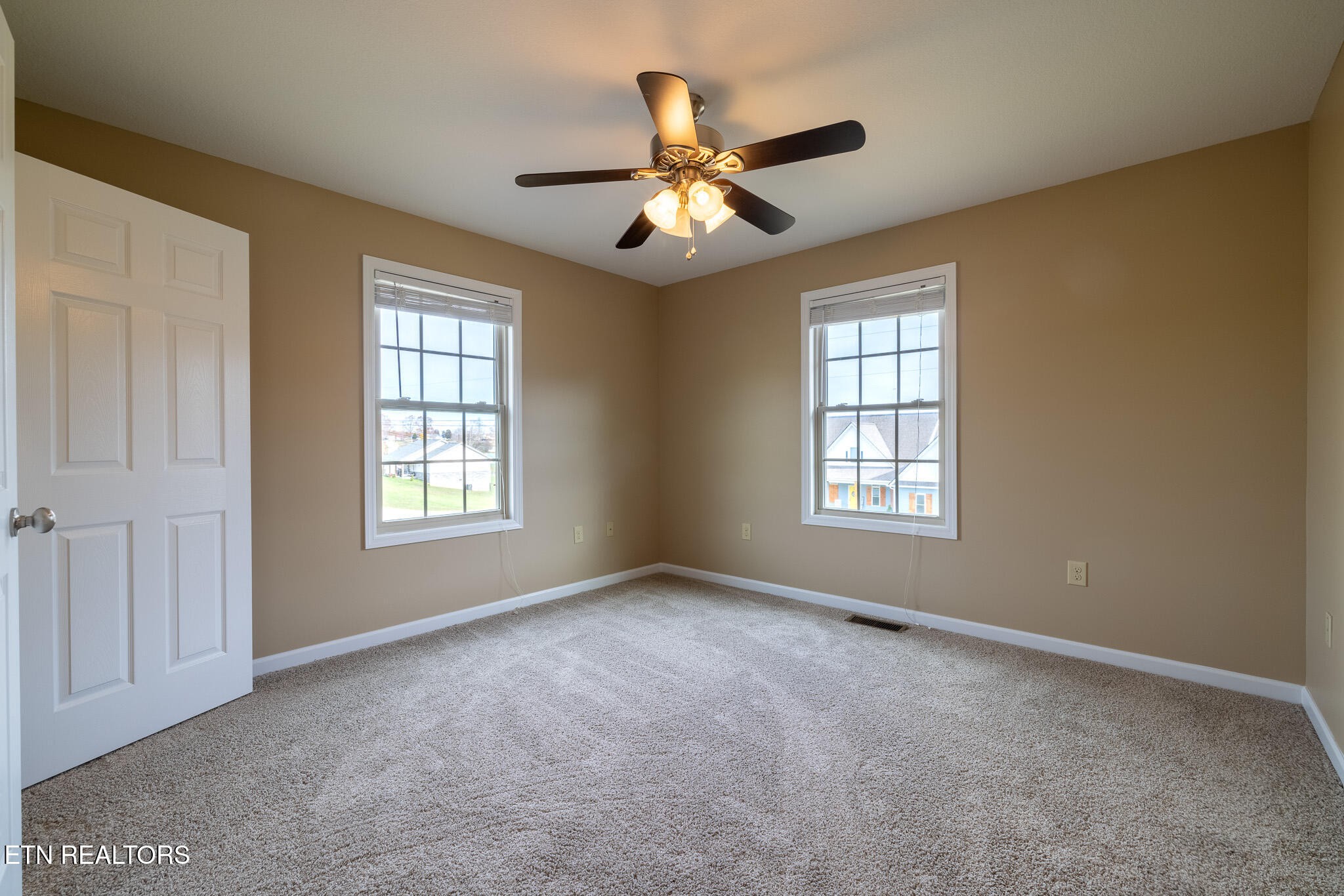 140 Washita Rutledge, TN 37861 - Photo 27 of 38 a view of an empty room with window and chandelier fan