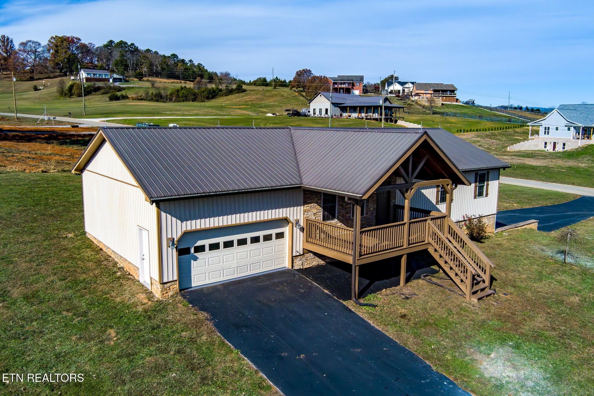 140 Washita Rutledge, TN 37861 - Photo 3 of 38 an aerial view of a house with a yard basket ball court and outdoor seating