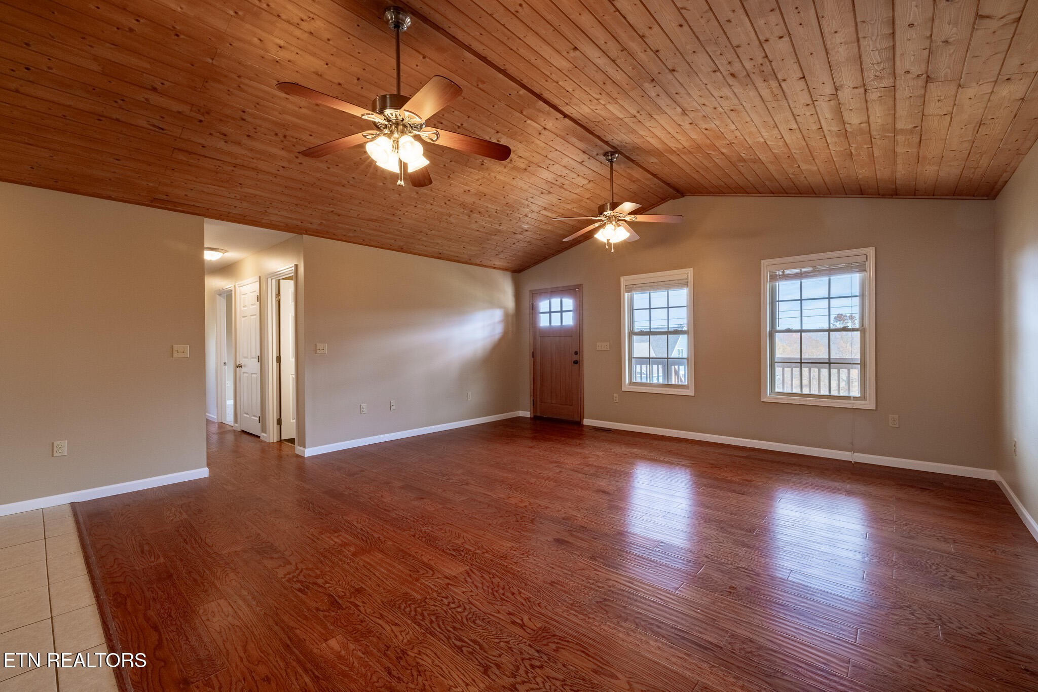 140 Washita Rutledge, TN 37861 - Photo 7 of 38 a view of an empty room with wooden floor and a window