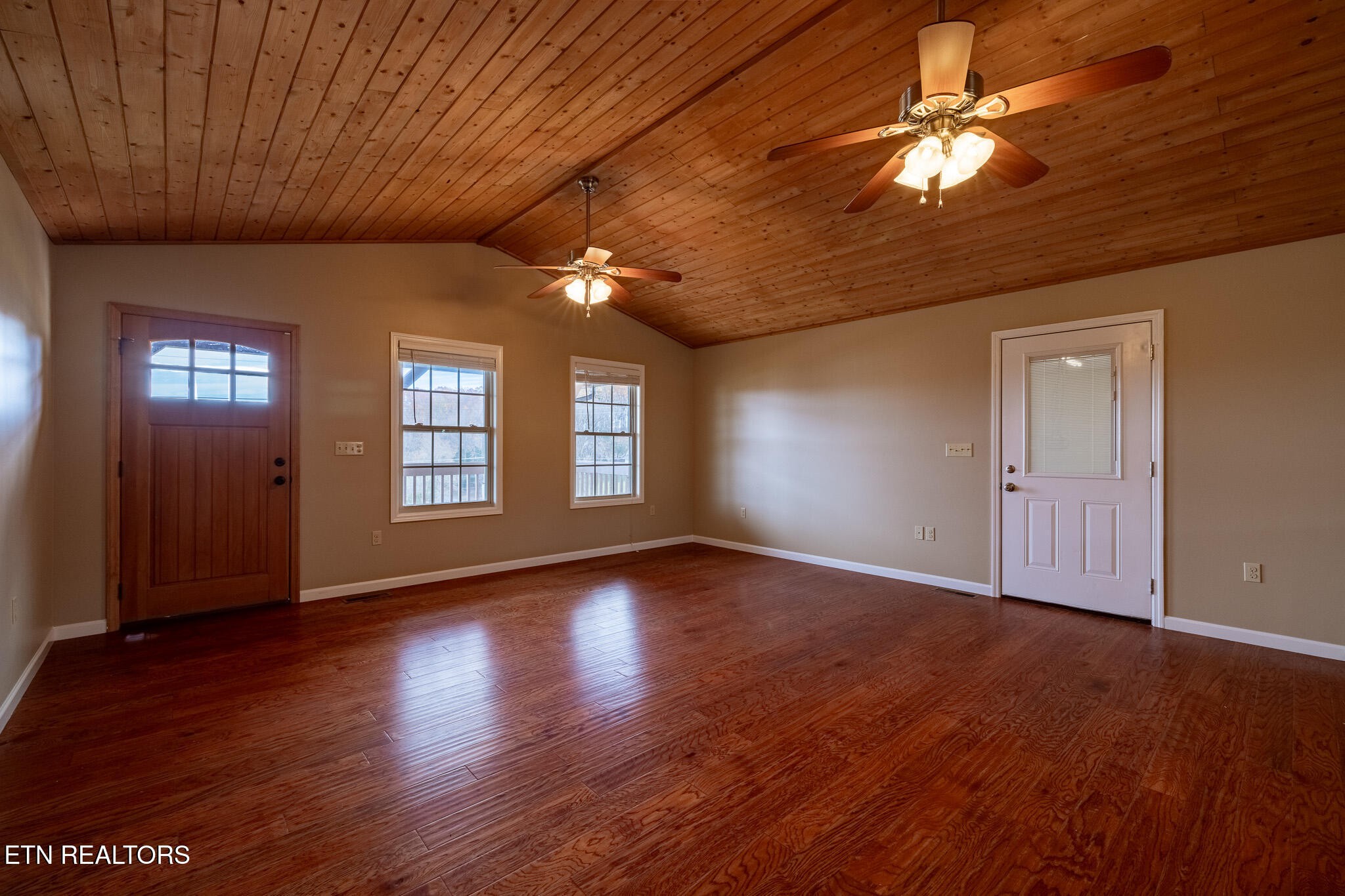 140 Washita Rutledge, TN 37861 - Photo 10 of 38 a view of livingroom with window hardwood floor and ceiling fan