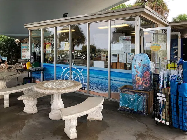 a outdoor space with lots of water fountain in front of it