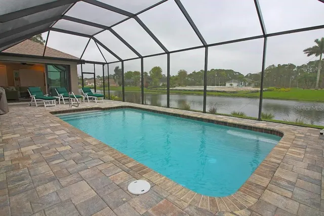 a view of outdoor space with swimming pool