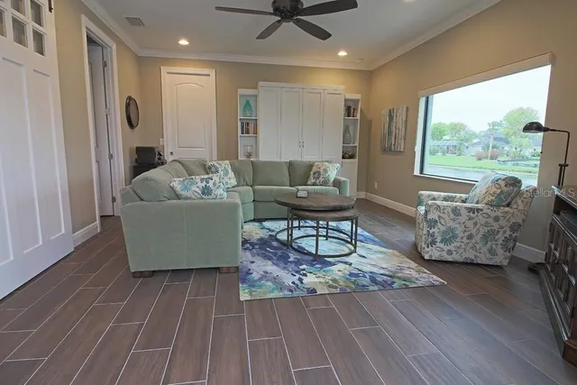 a living room with furniture and a rug