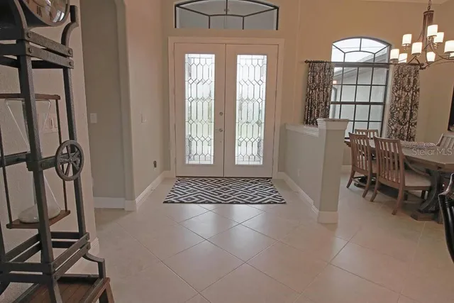 a view of a livingroom with furniture and window