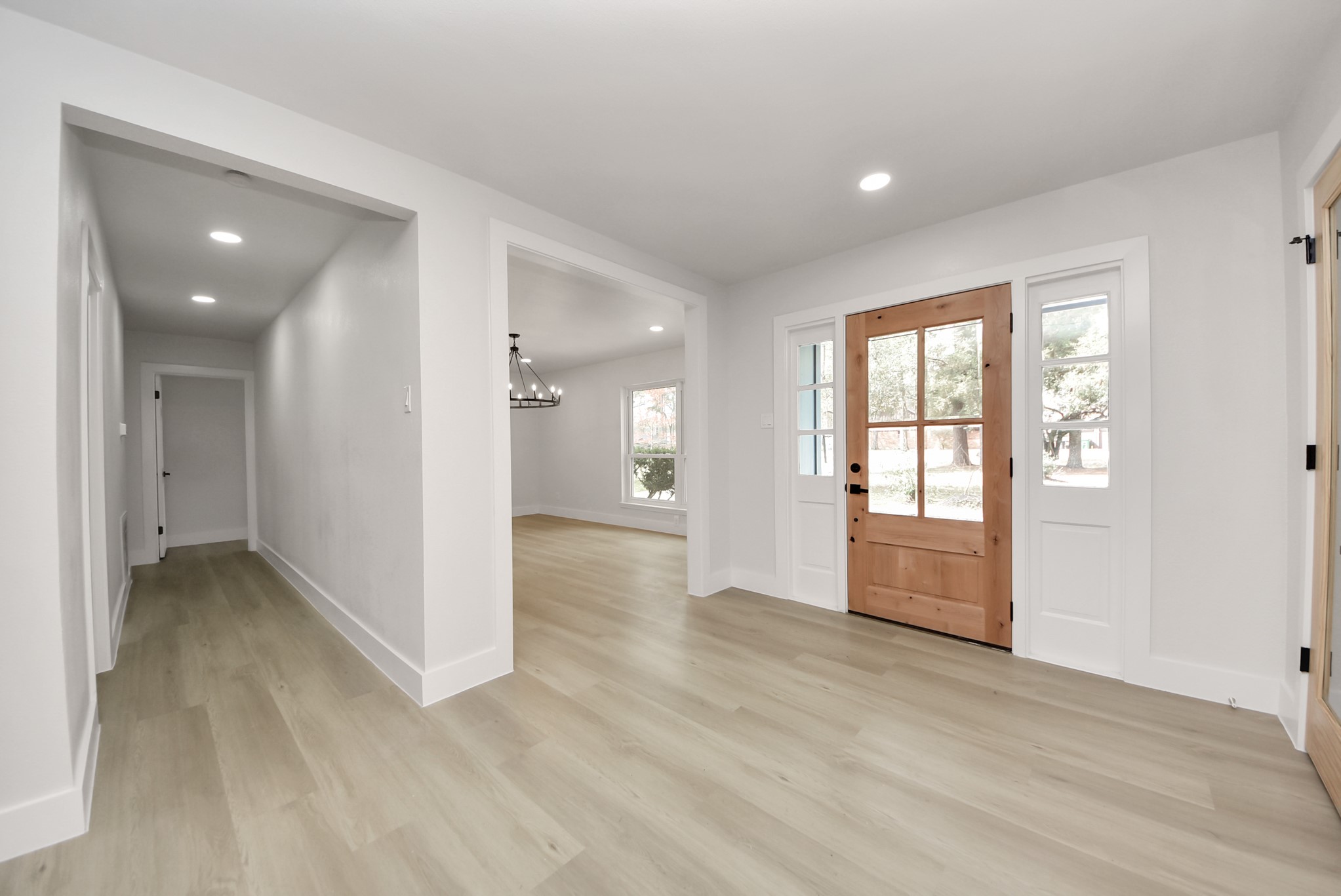 26206 Maplewood Drive Spring, TX 77386 - Photo 7 of 47 wooden floor in an empty room with a window