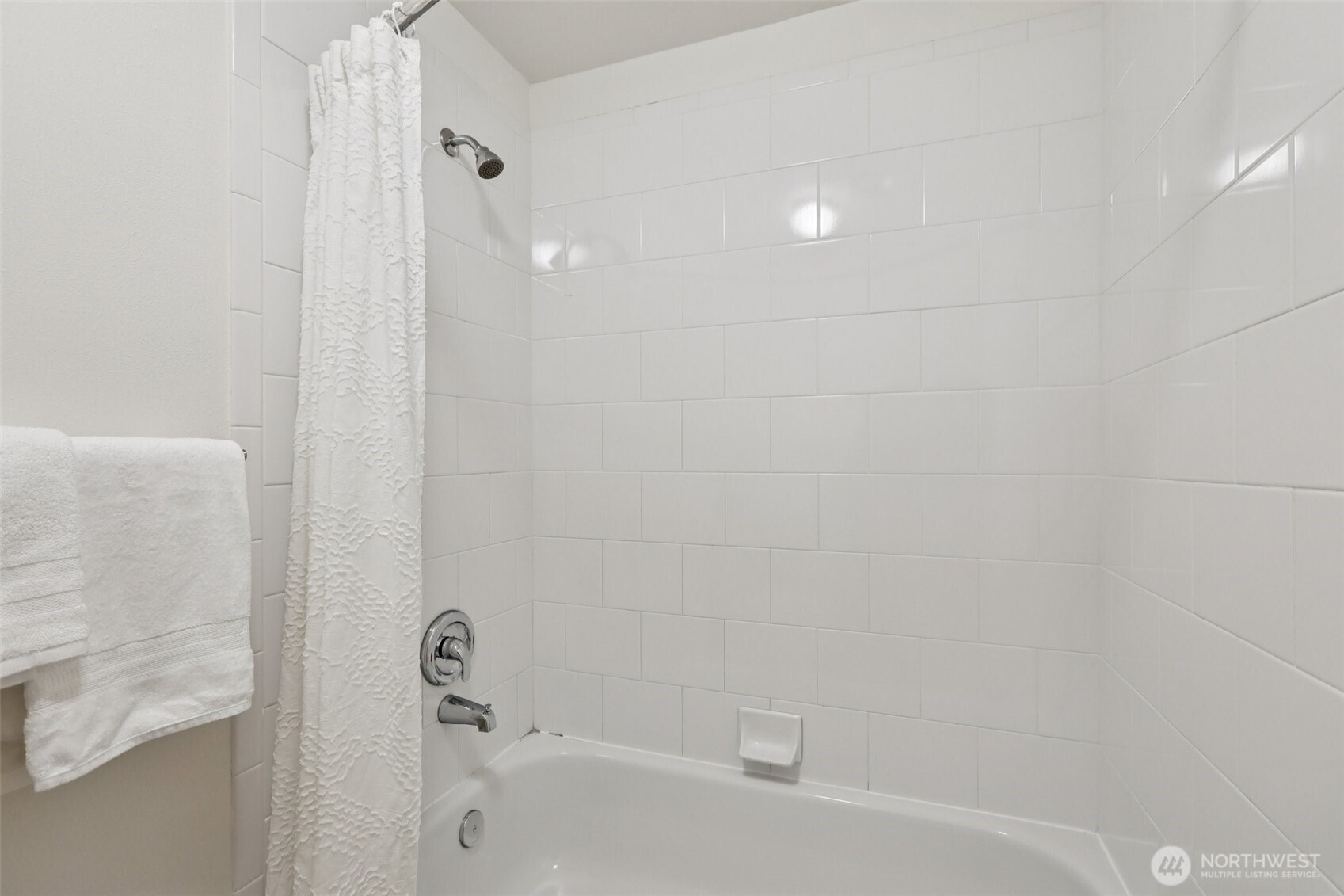 960 5th Avenue South, Unit 208 Edmonds, WA 98020 - Photo 23 of 26 a bathroom with a bathtub