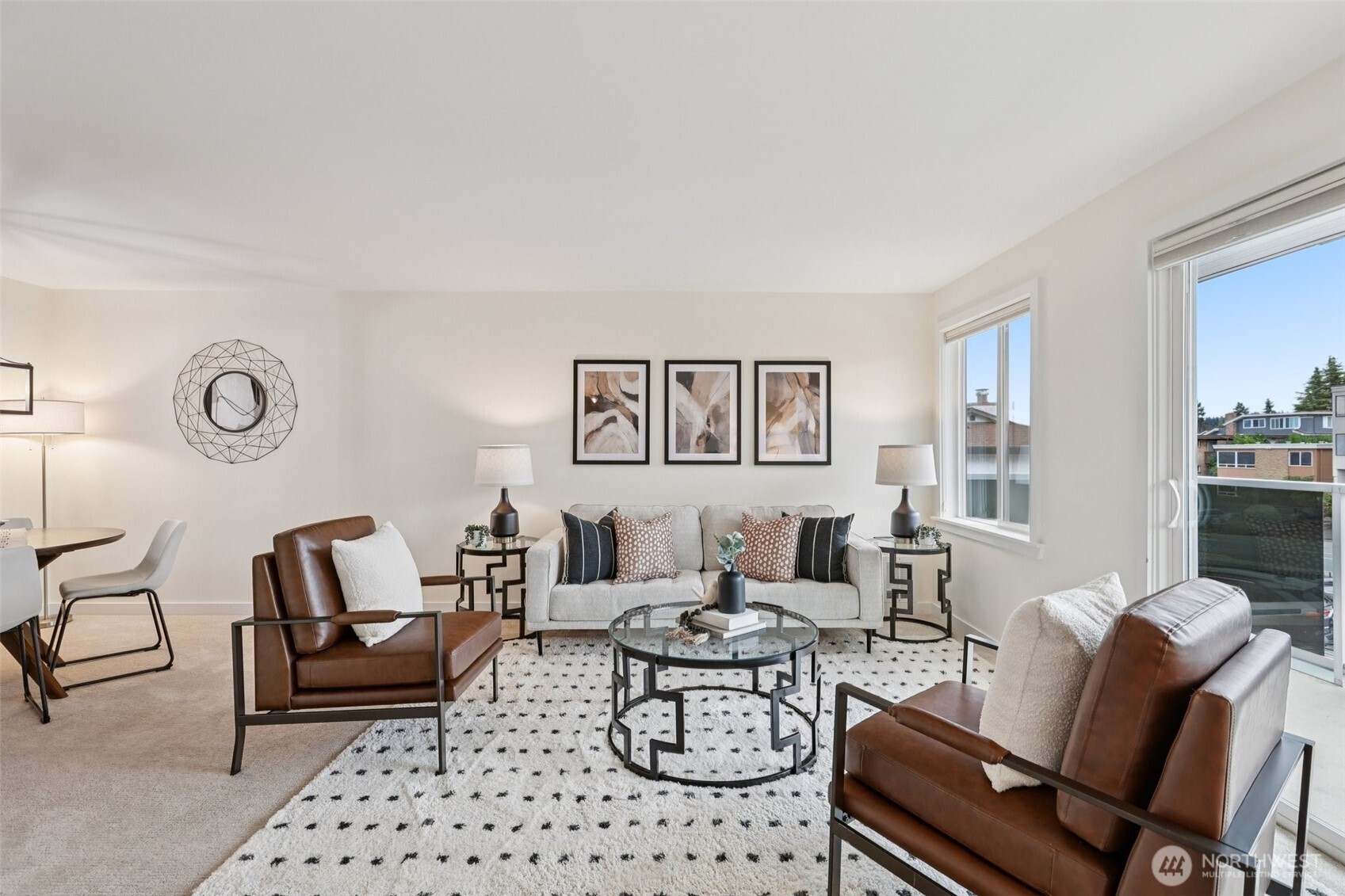 960 5th Avenue South, Unit 208 Edmonds, WA 98020 - Photo 8 of 26 a living room with furniture a rug and a table