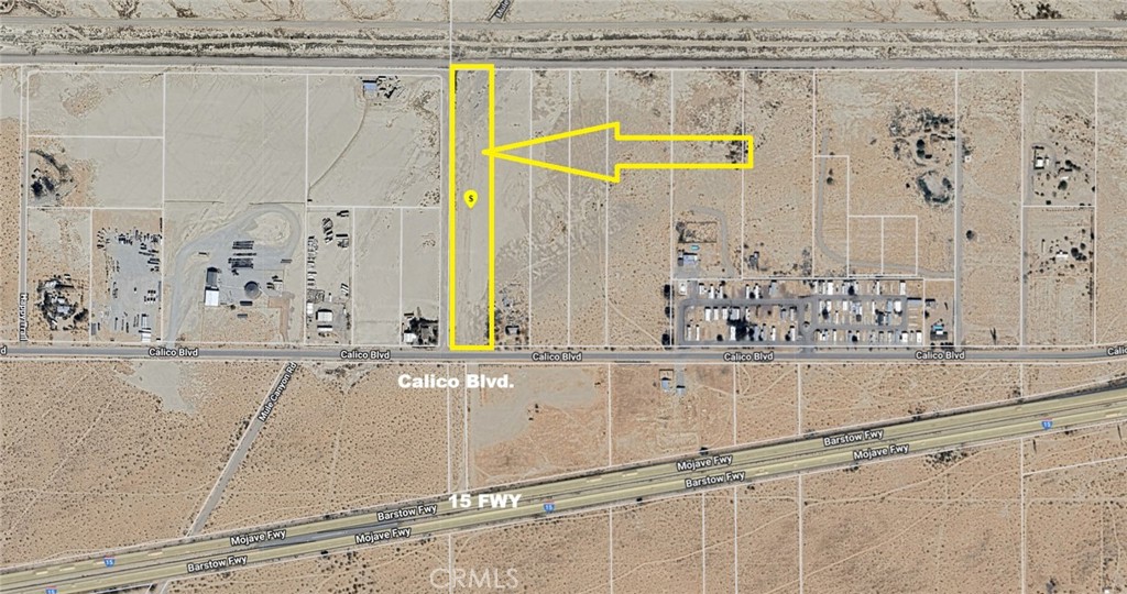 0 Calico Boulevard Yermo, CA 92398 - Photo 12 of 12 a view of a bathroom with a window and a white bath tub sitting next to a window