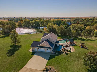 12747 Harrold Point Road Wapella, IL 61777 - Photo 7 of 48 an aerial view of a house with a yard