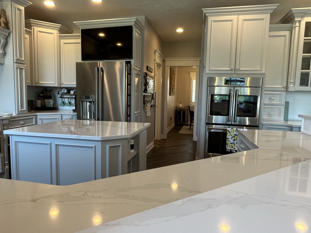 12747 Harrold Point Road Wapella, IL 61777 - Photo 9 of 48 a kitchen with stainless steel appliances a refrigerator sink and cabinets