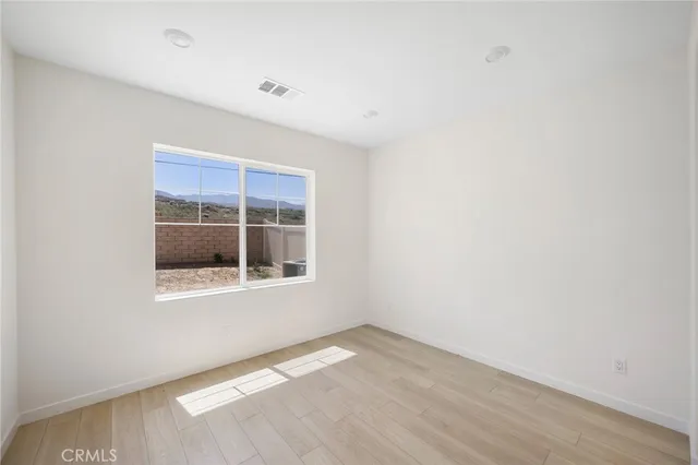 a view of empty room with a window