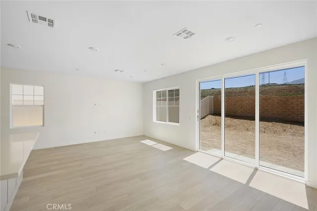 a view of an empty room with window