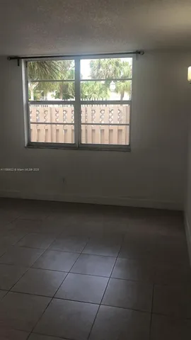 a living room with a window