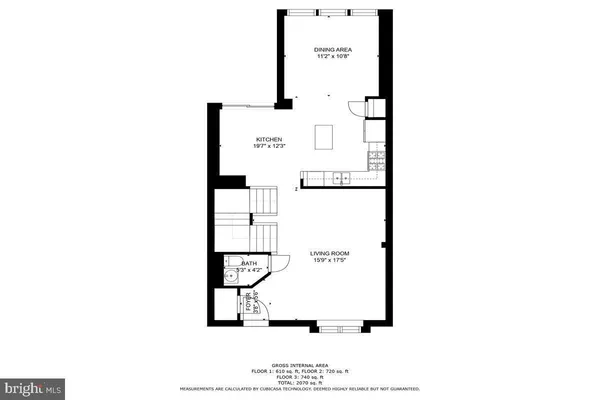 a front view of a house with yard and seating space