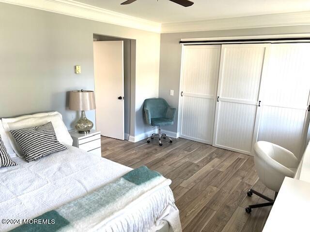 8 Augusta Road, Unit 73 Whiting, NJ 08759 - Photo 16 of 22 a bedroom with a bed and wooden floor