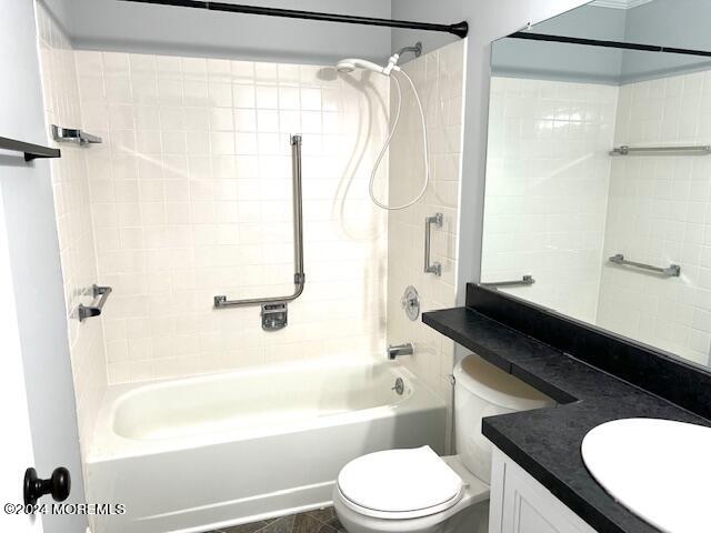 8 Augusta Road, Unit 73 Whiting, NJ 08759 - Photo 18 of 22 a bathroom with a granite countertop bathtub shower sink vanity and toilet