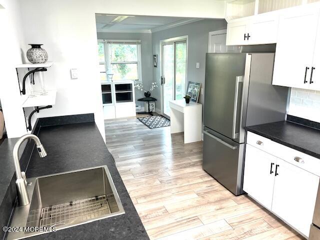 8 Augusta Road, Unit 73 Whiting, NJ 08759 - Photo 10 of 22 a kitchen with refrigerator and window