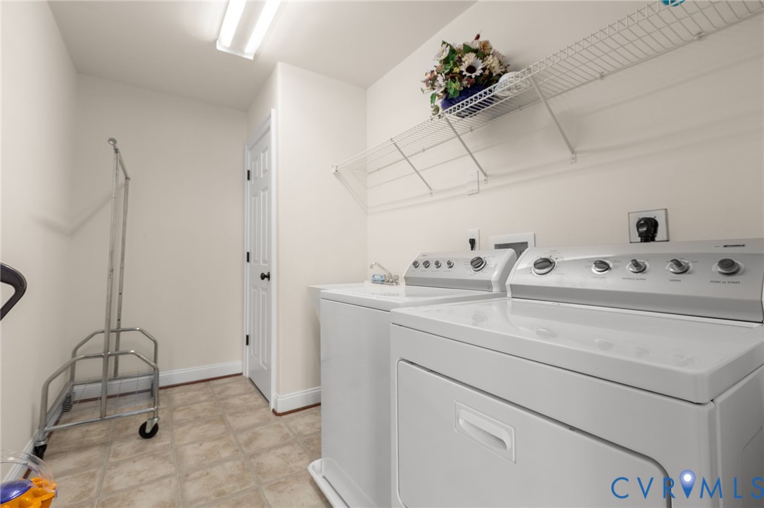 175 Shellfield Lane Colonial Beach, VA 22443 - Photo 33 of 100 Laundry room featuring washing machine and clothes