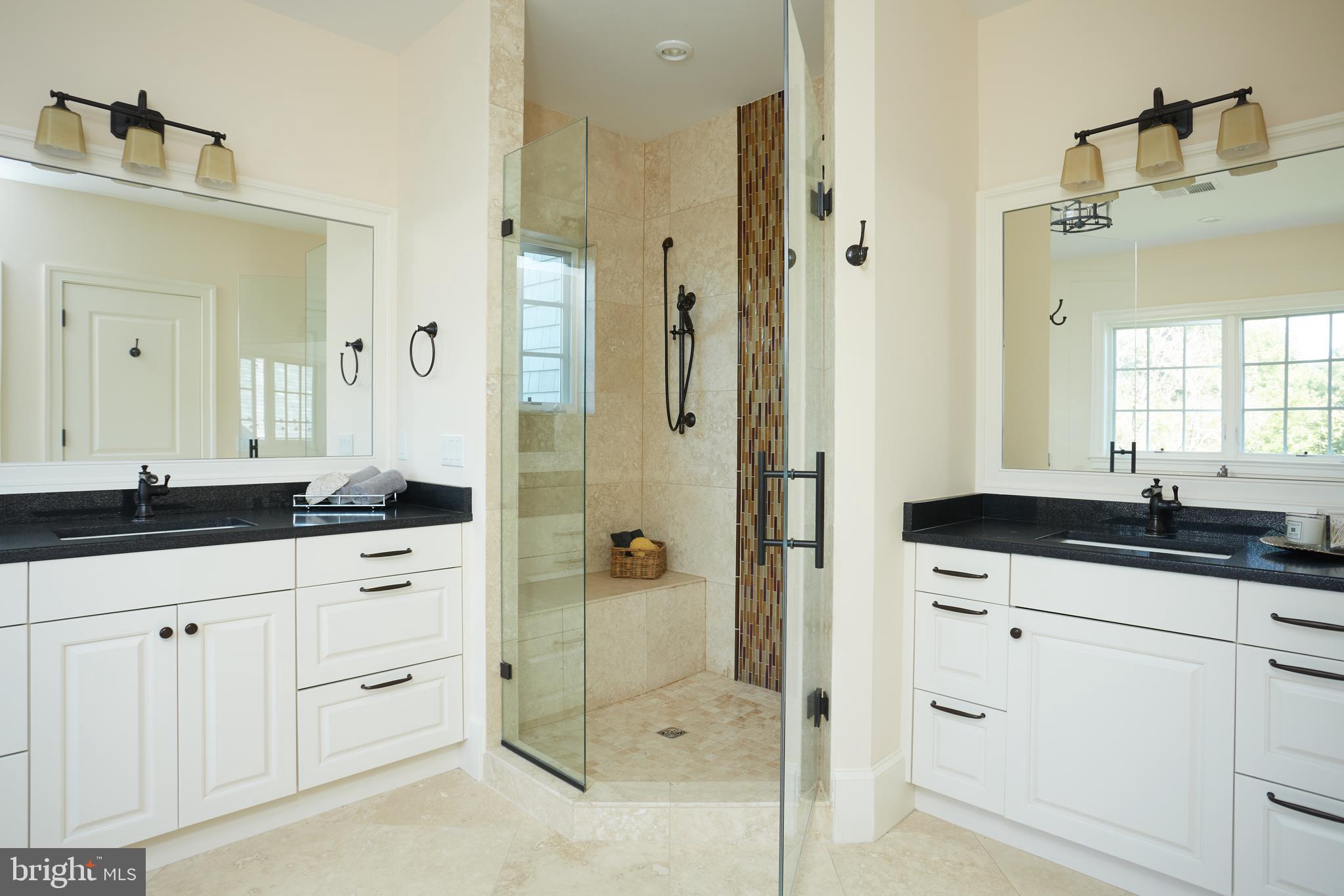 8003 Maple Ridge Road Bethesda, MD 20814 - Photo 19 of 30 a bath room with sink shower and mirror