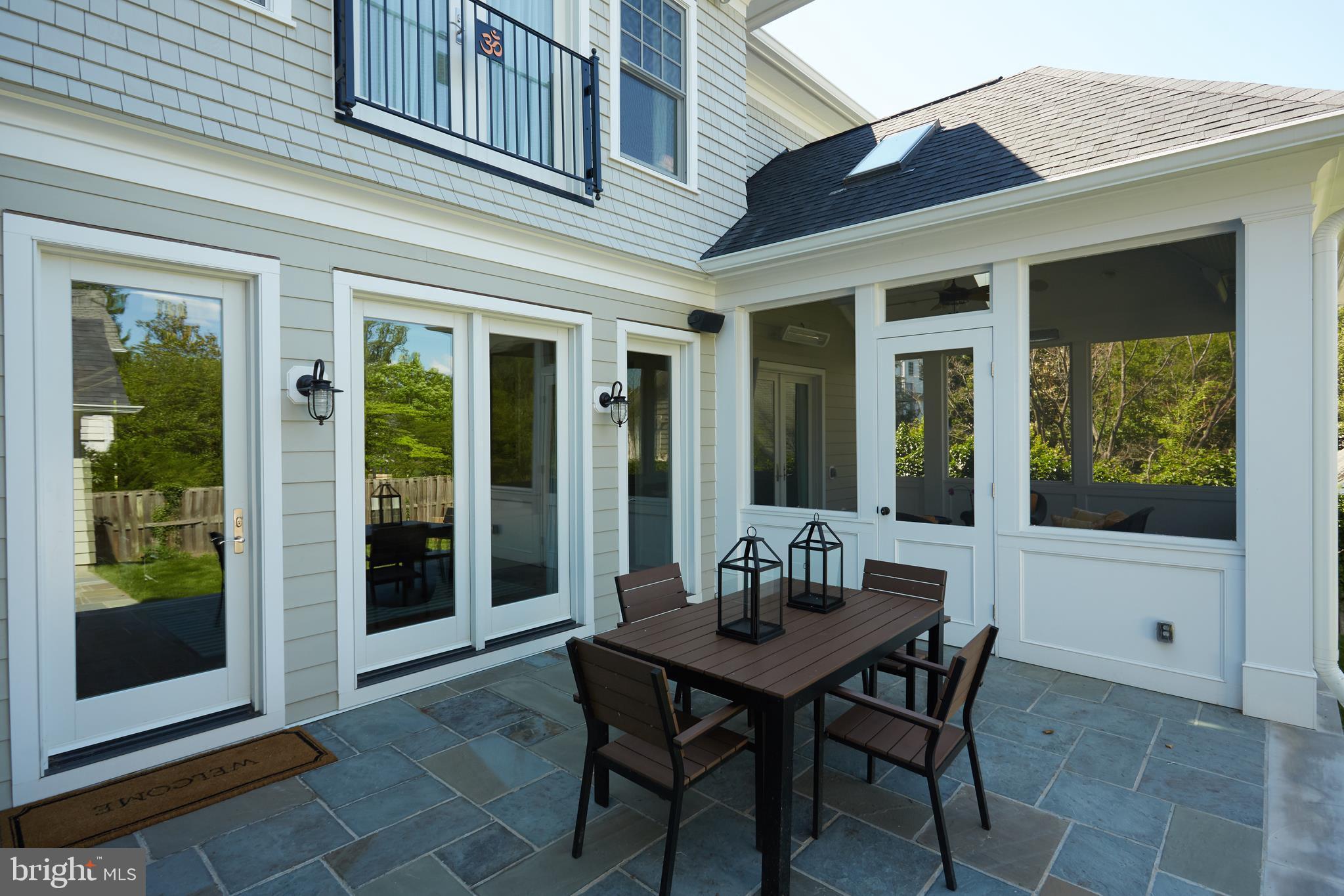 8003 Maple Ridge Road Bethesda, MD 20814 - Photo 22 of 30 a view of a dining room with a table and chairs