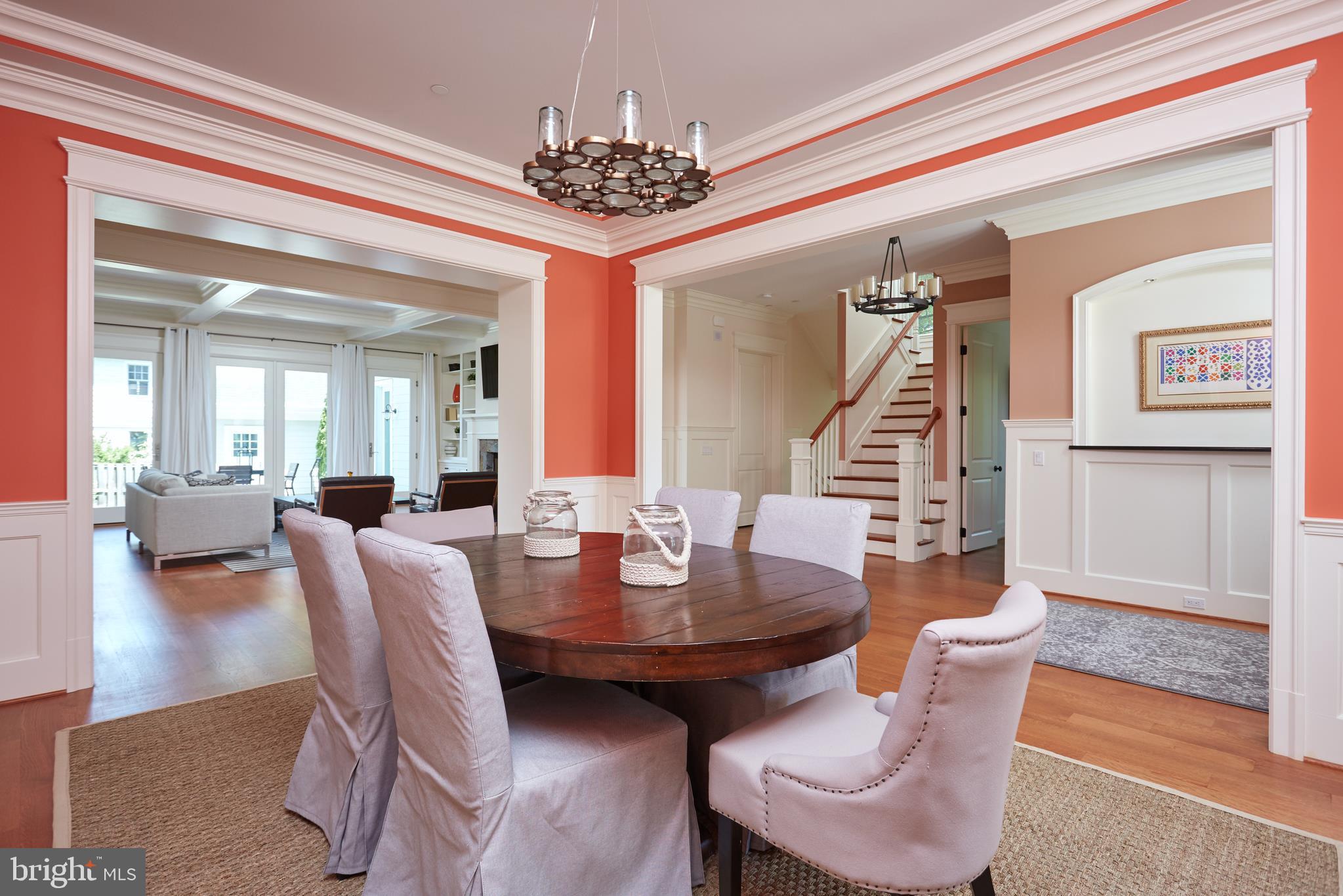 8003 Maple Ridge Road Bethesda, MD 20814 - Photo 5 of 30 a view of a dining room with furniture and wooden floor