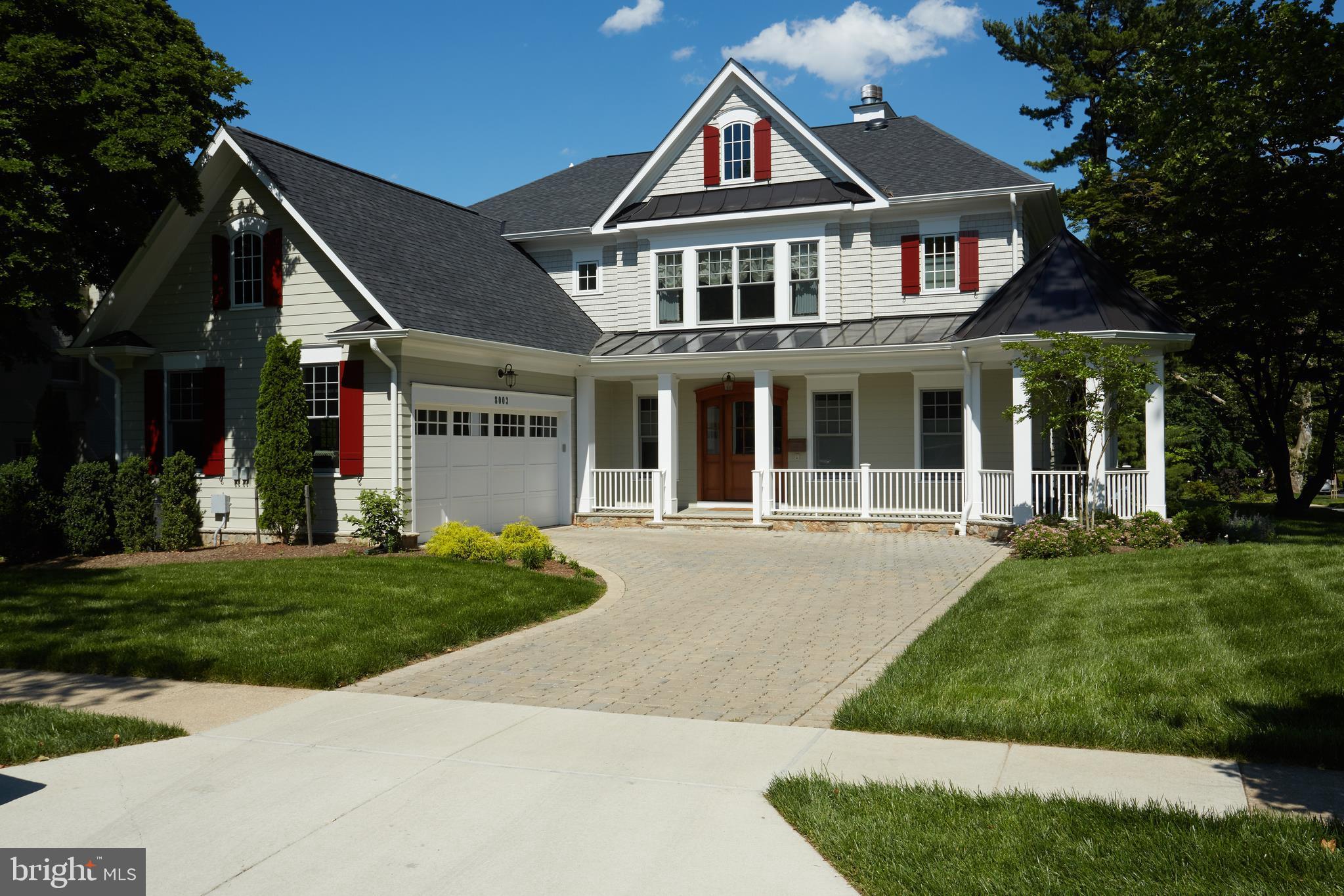 8003 Maple Ridge Road Bethesda, MD 20814 - Photo 8 of 30 front view of a house with a yard