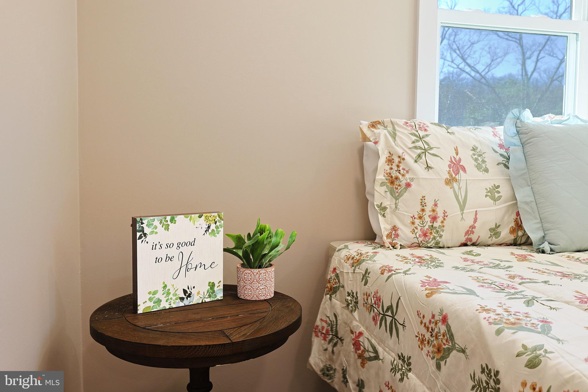 502 Sol Shanholtz Road Augusta, WV 26704 - Photo 33 of 61 a bedroom with a bed and a chair