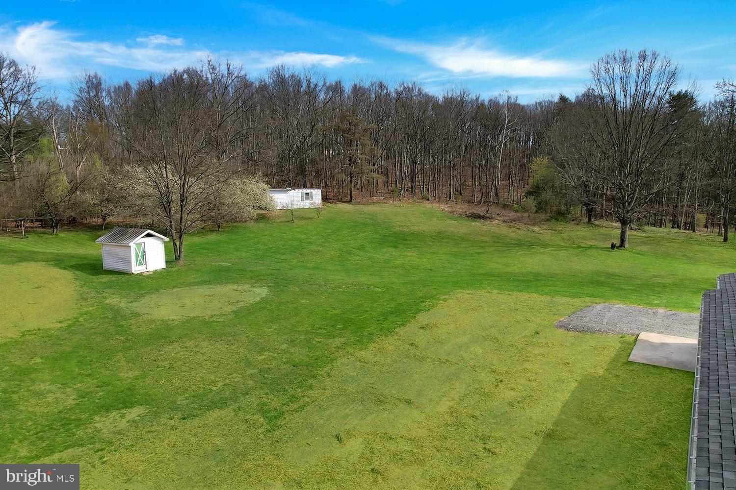 502 Sol Shanholtz Road Augusta, WV 26704 - Photo 56 of 61 a view of a golf course with a garden