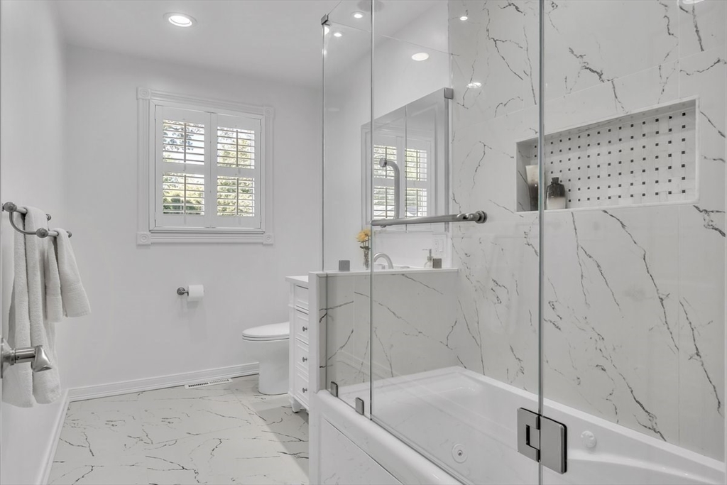 6 Strathmore Road Dartmouth, MA 02747 - Photo 22 of 38 a bathroom with a shower a toilet and sink