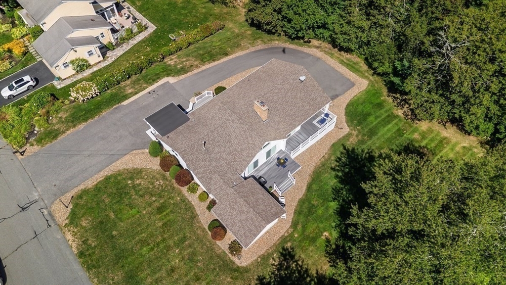 6 Strathmore Road Dartmouth, MA 02747 - Photo 36 of 38 an aerial view of a house with a yard and trees