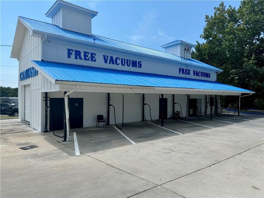 605 South Wall Street Calhoun, GA 30701 - Photo 2 of 11 a view of a building with retail shop