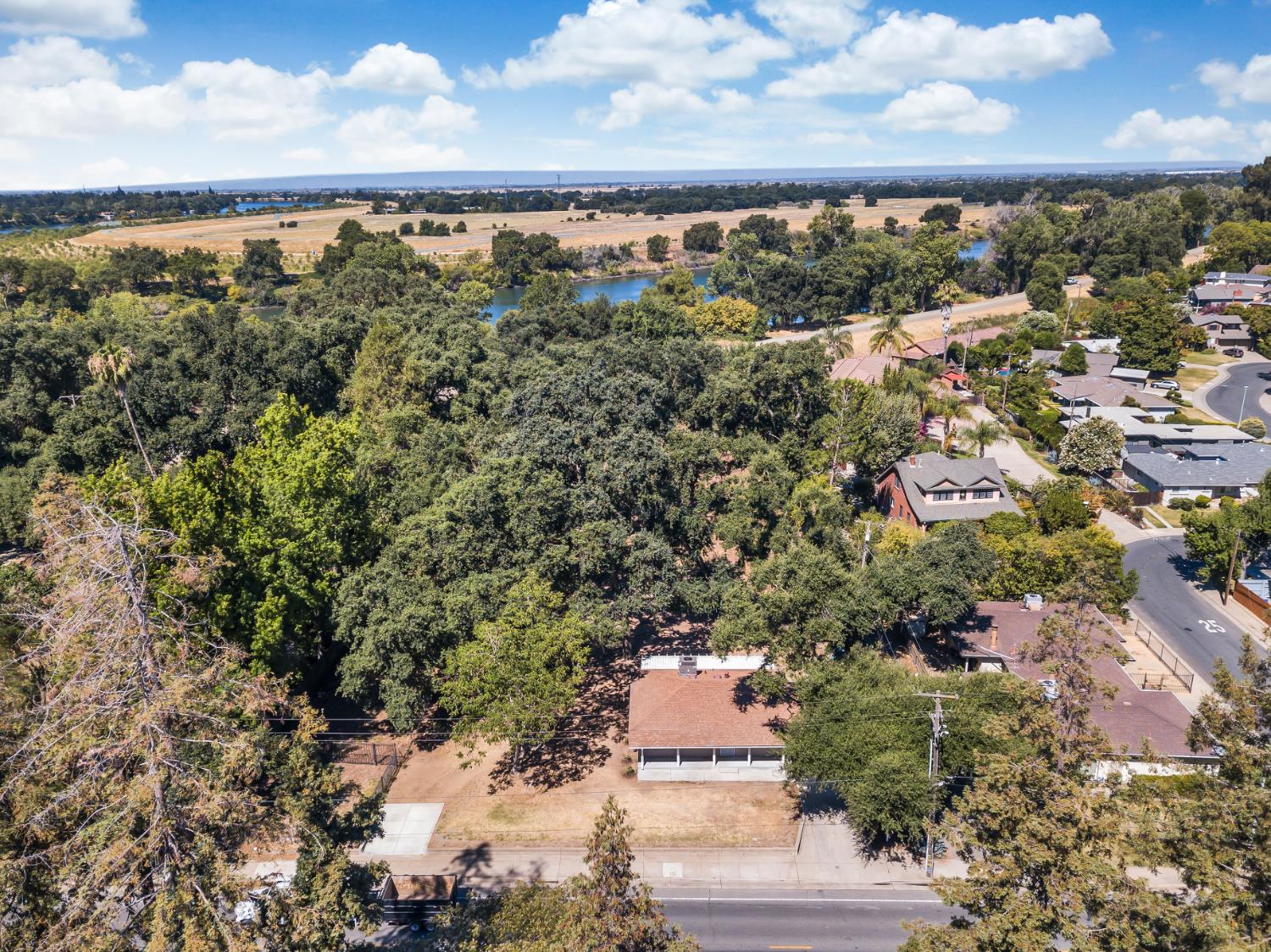 5720 Riverside Boulevard Sacramento, CA 95822 - Photo 15 of 54 a view of a city with large trees