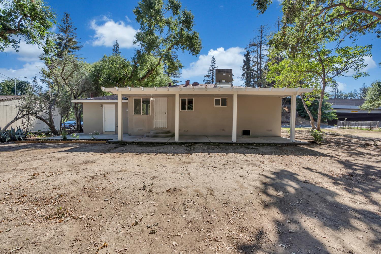 5720 Riverside Boulevard Sacramento, CA 95822 - Photo 24 of 54 front view of a house with a yard