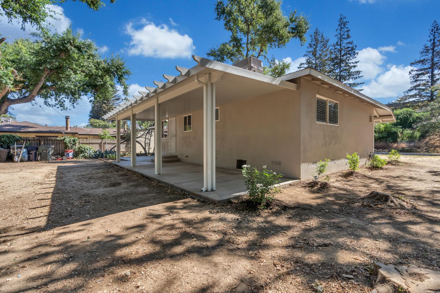 5720 Riverside Boulevard Sacramento, CA 95822 - Photo 25 of 54 a view of a house with a yard