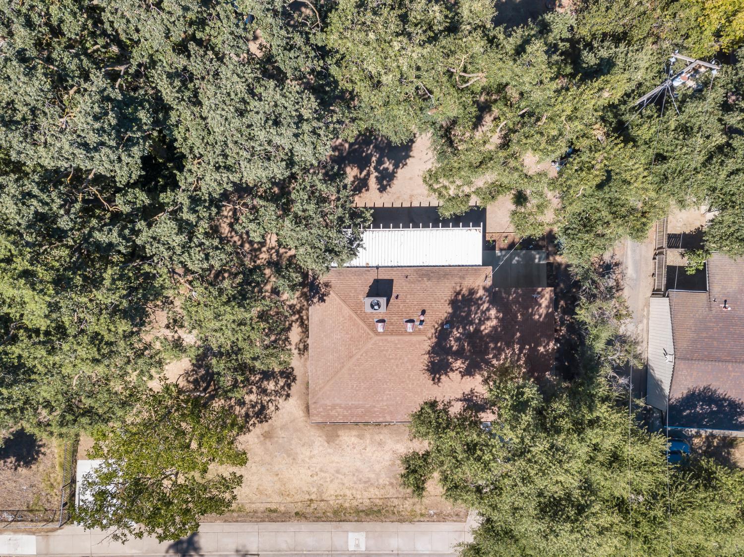 5720 Riverside Boulevard Sacramento, CA 95822 - Photo 6 of 54 an aerial view of a house with a yard