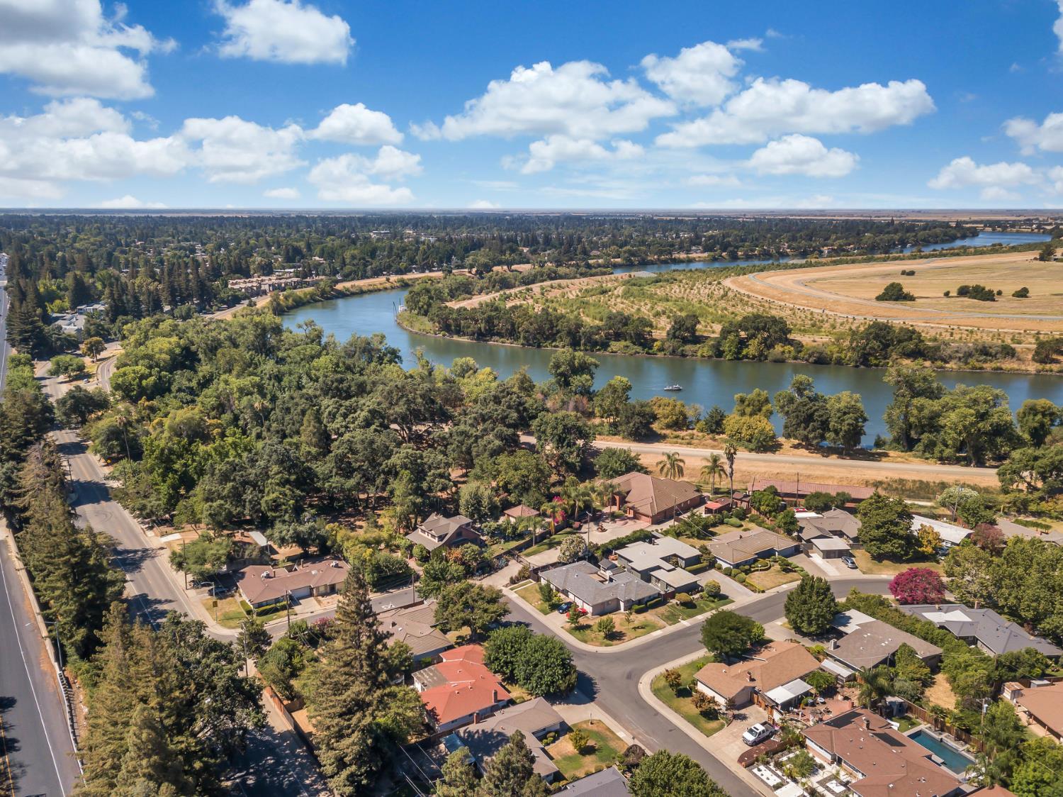 5720 Riverside Boulevard Sacramento, CA 95822 - Photo 9 of 54 an aerial view of residential building and lake