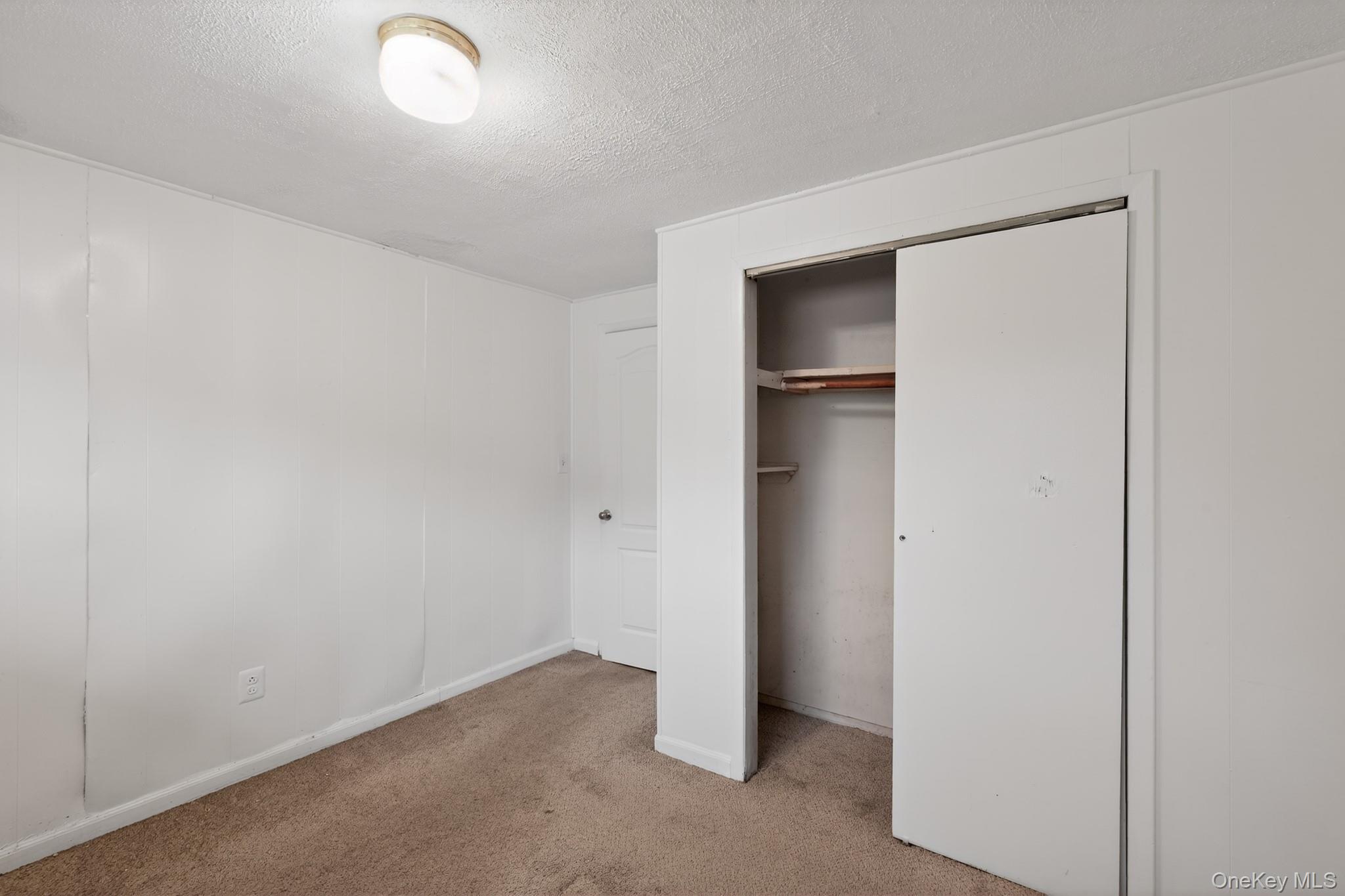 138 Spring Street Massapequa, NY 11758 - Photo 31 of 45 a view of an empty room