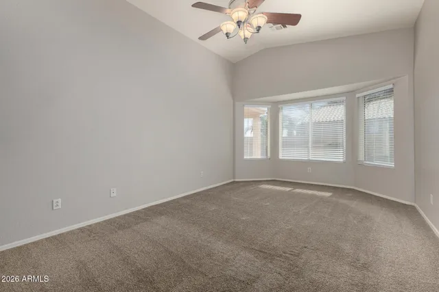 a kitchen with stainless steel appliances a refrigerator sink and stove