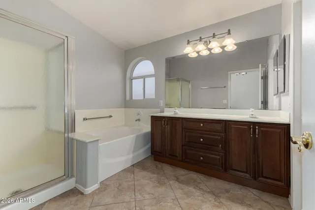 a view of a livingroom with a ceiling fan and window