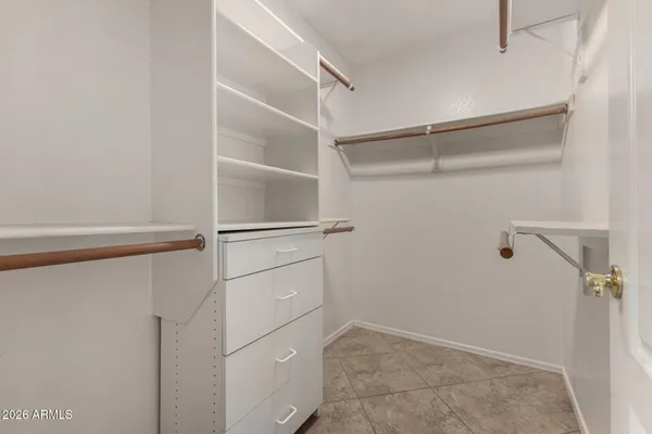 a view of an empty walk in closet