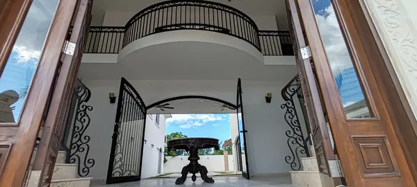 a view of an entryway with a front door