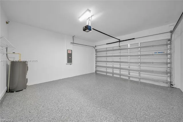 a view of empty room with white walls