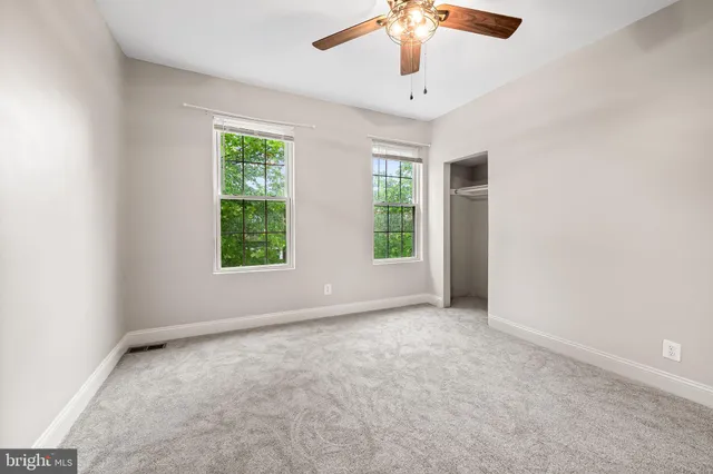 an empty room with windows